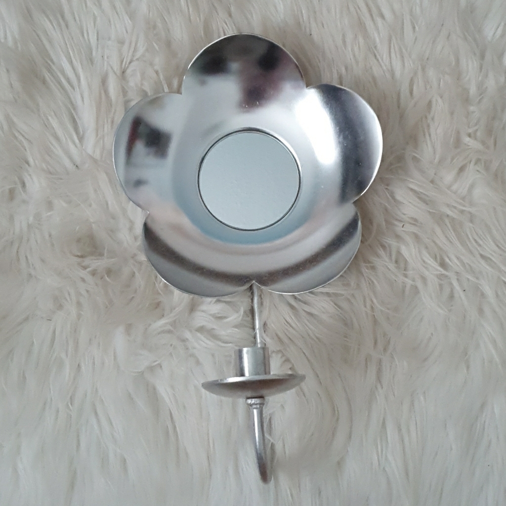 Metal flower mirror and small candle holder